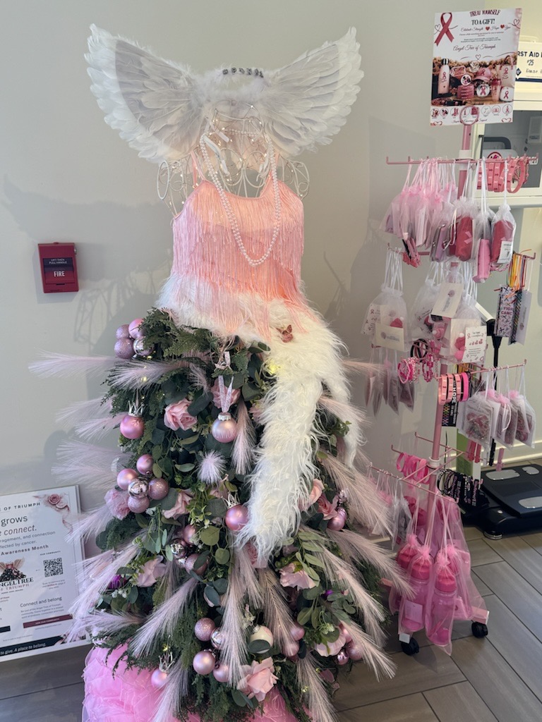 Winged Angel Tree dress with pink decorations and keepsake display at SPENGA